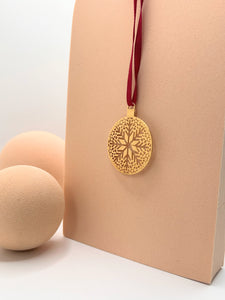 Gold plated snow flake ball ornament